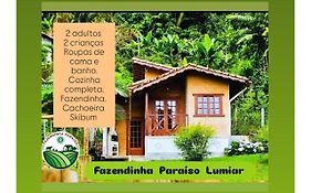 Chalé com cachoeira , próximo ao centro lumiar